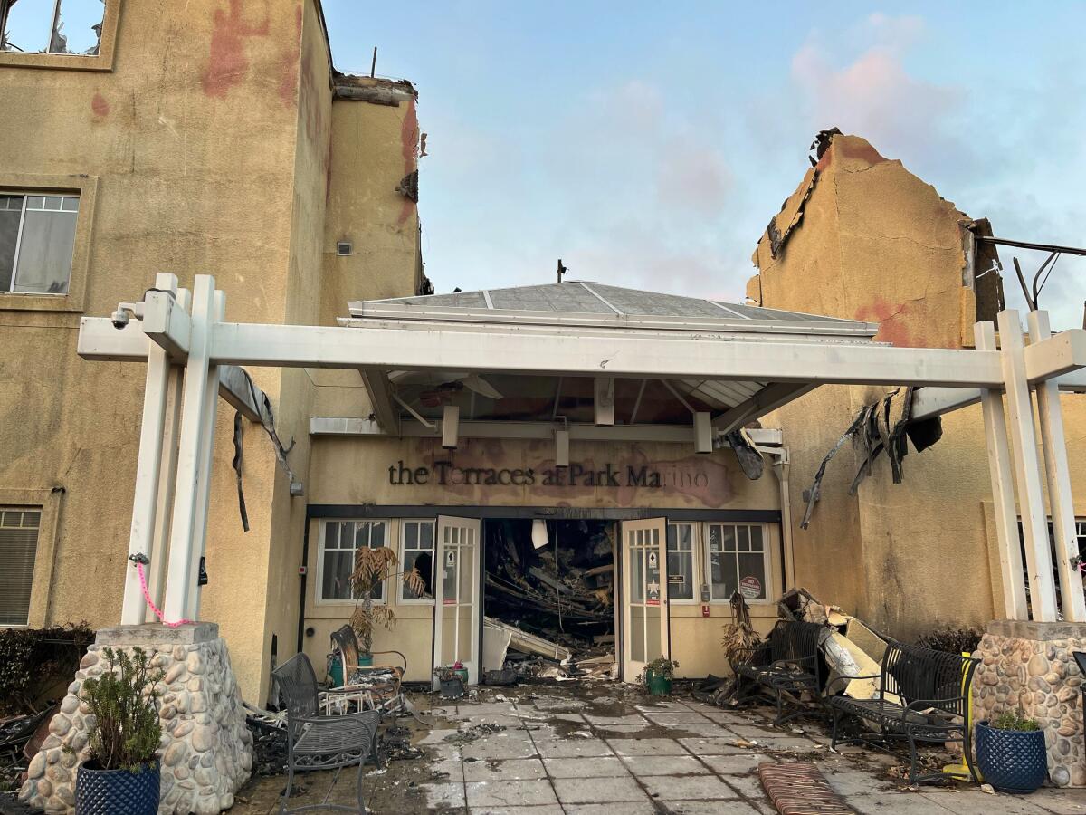 The entryway of a fire-damaged building.
