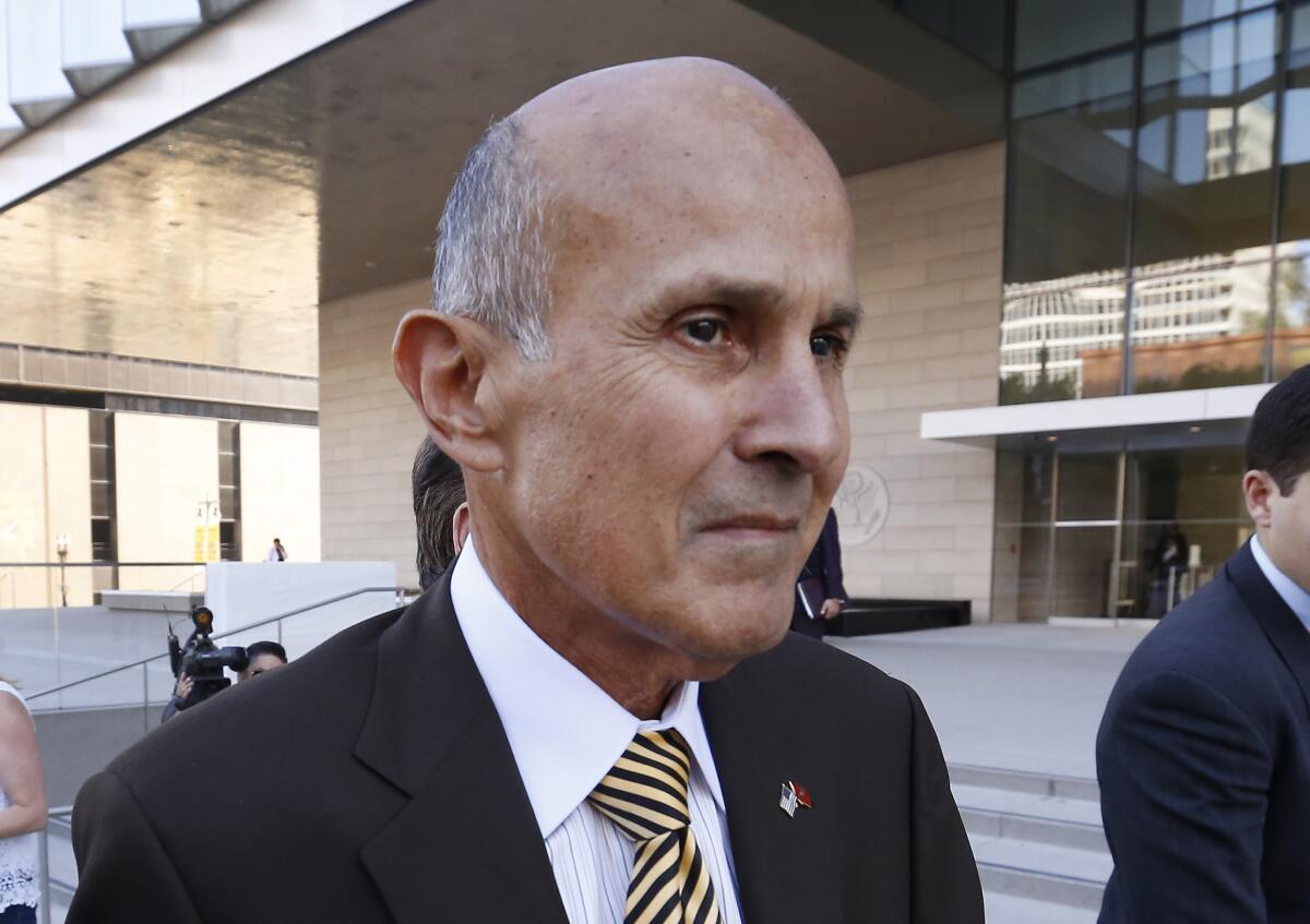 LOS ANGELES - Former Los Angeles County Sheriff Lee Baca departs from the Los Angeles Federal Courthouse in 2017 after he was convicted of three federal charges of orchestrating a scheme to thwart an FBI investigation into inmate mistreatment in the jails he ran