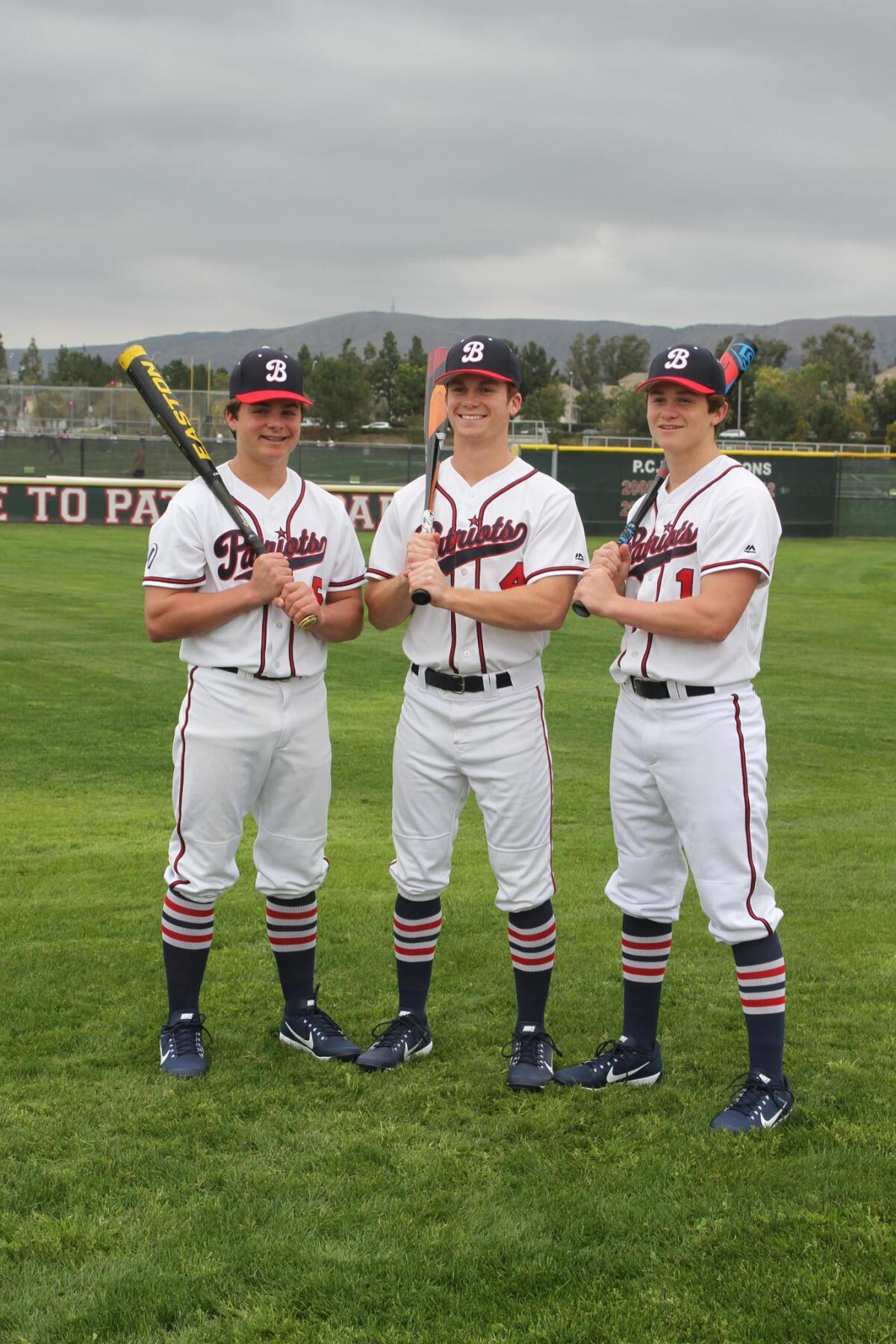 The three McLain brothers playing for Beckman in 2017: from left, freshman Nick, senior Matt and junior Sean.