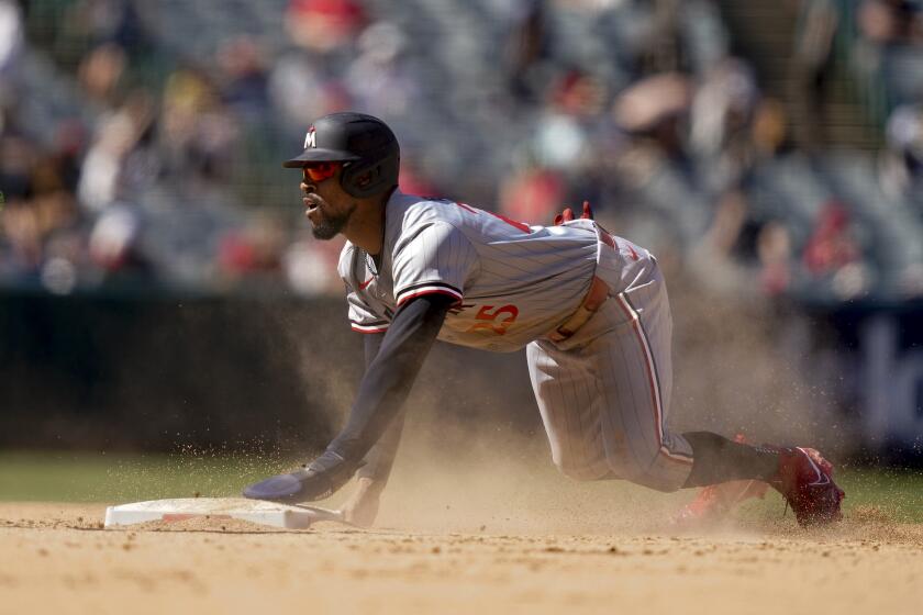 Minnesota Twins' Byron Buxton steals second base during the eighth inning of a baseball game against the Los Angeles Angels, Sunday, April 28, 2024, in Anaheim, Calif. (AP Photo/Ryan Sun)