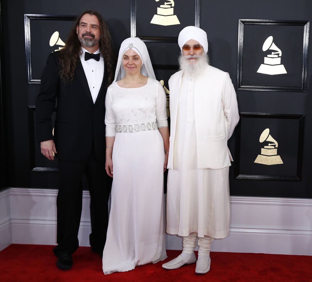 New Age nominees White Sun (Adam Berry, Gurujaas and Hari Jiwan Singh Khalsa) arrive at the 59th Grammy Awards.