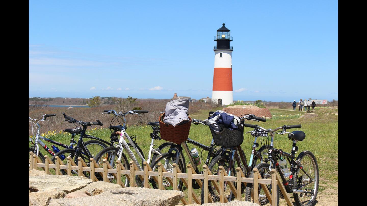 Sankaty Head Light (1850) and nearby 'Sconset Beach are destinations for bicyclists who explore the island via Polpis Road, one of several popular bike routes.