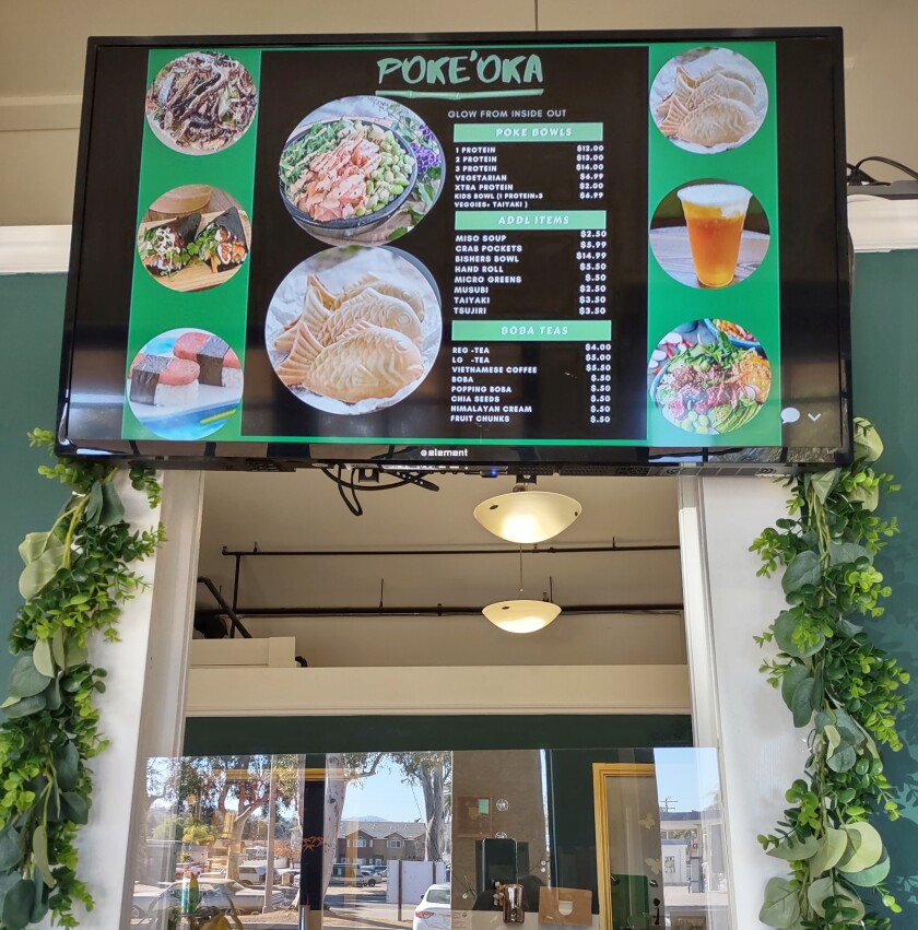 Poke'Oka customers can choose from a variety of healthy proteins, rice, salads and vegetables on the menu.