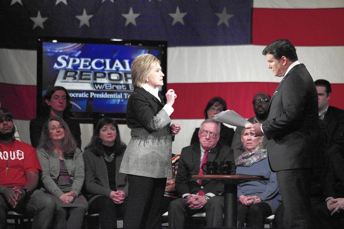Hillary Clinton participates in a Fox News town hall in Detroit with host Bret Baier.