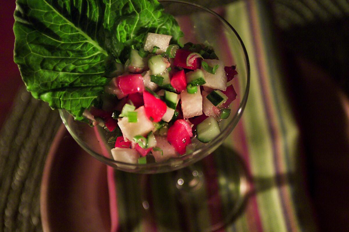 Israeli salad with diced cucumber and jicima.