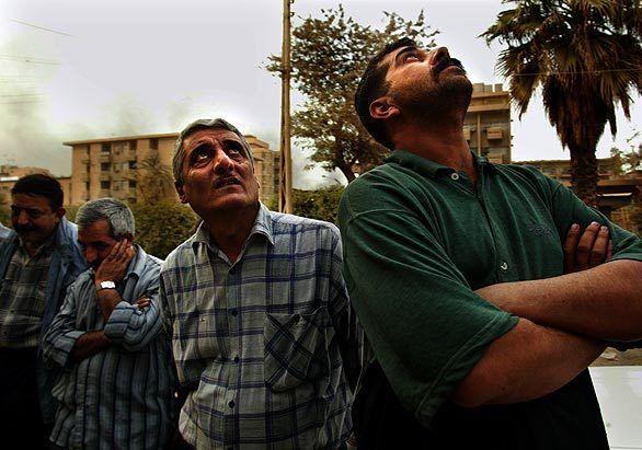 Baghdad residents during bombing