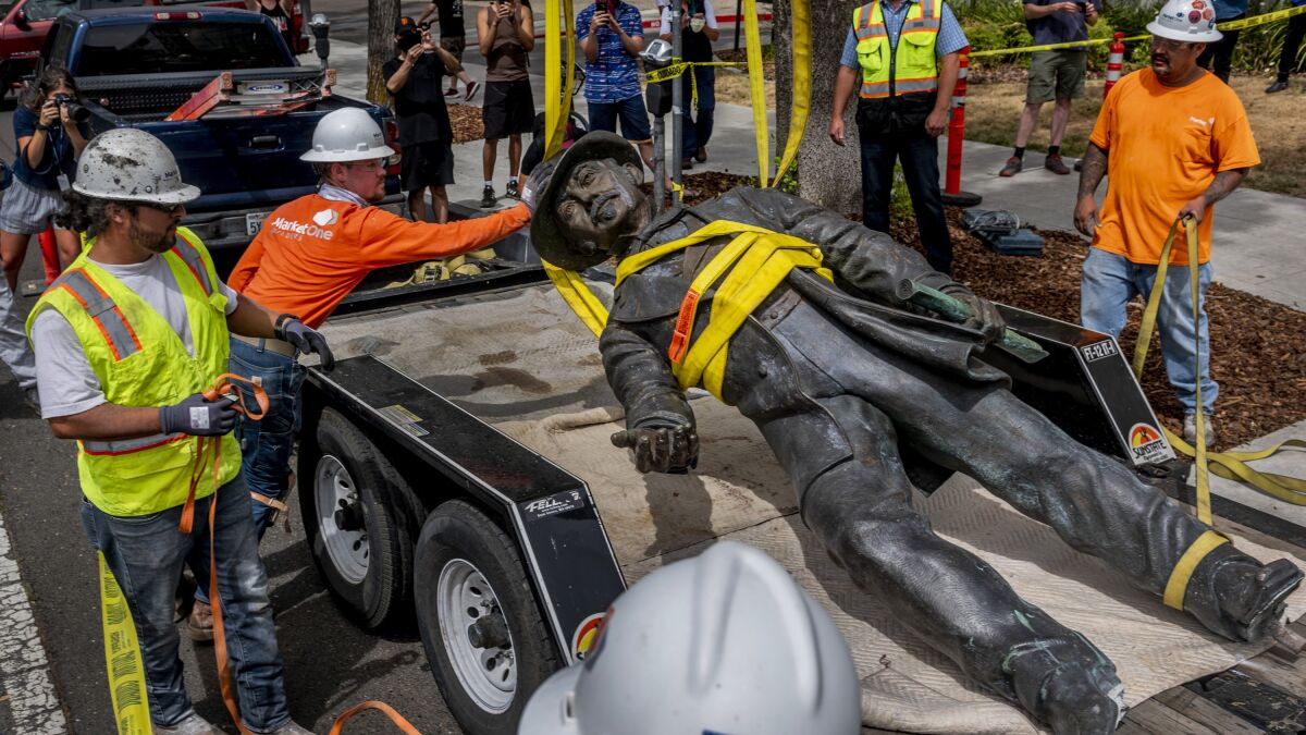 John Sutter statue being defaced in Sacramento Angeles Times