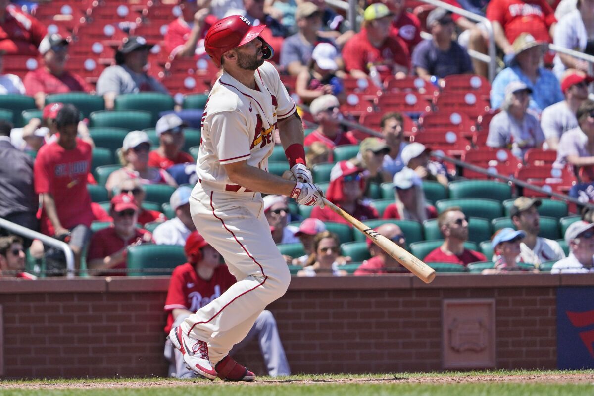 St. Louis Cardinals' Paul Goldschmidt watches his two-run home run during the second inning of a baseball game against the Cincinnati Reds Saturday, July 16, 2022, in St. Louis. (AP Photo/Jeff Roberson)