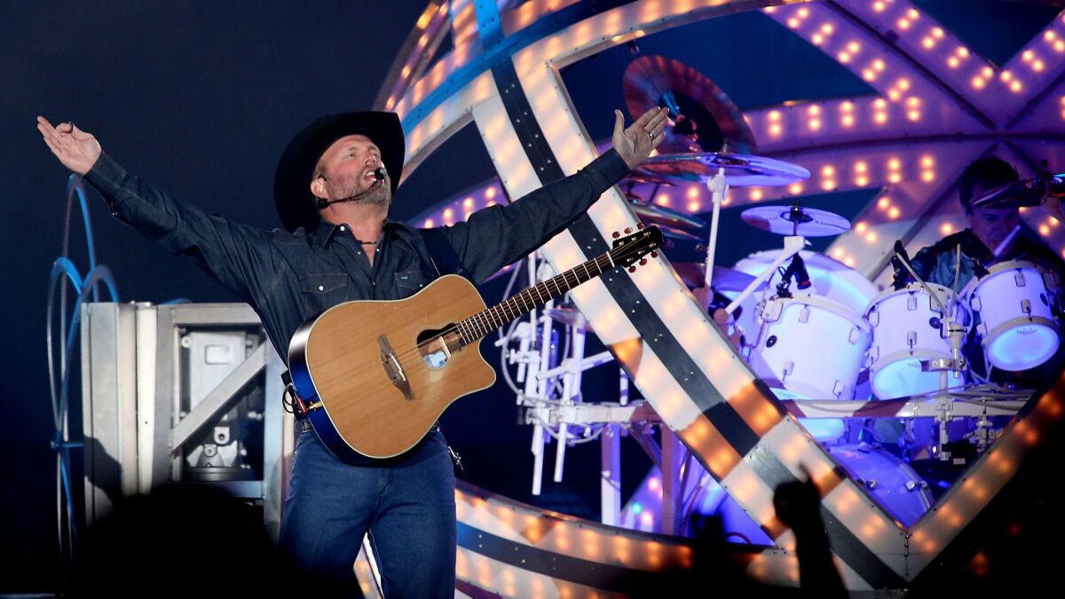 Garth Brooks soaks up fans' adoration during his performance Saturday at the Forum in Inglewood.
