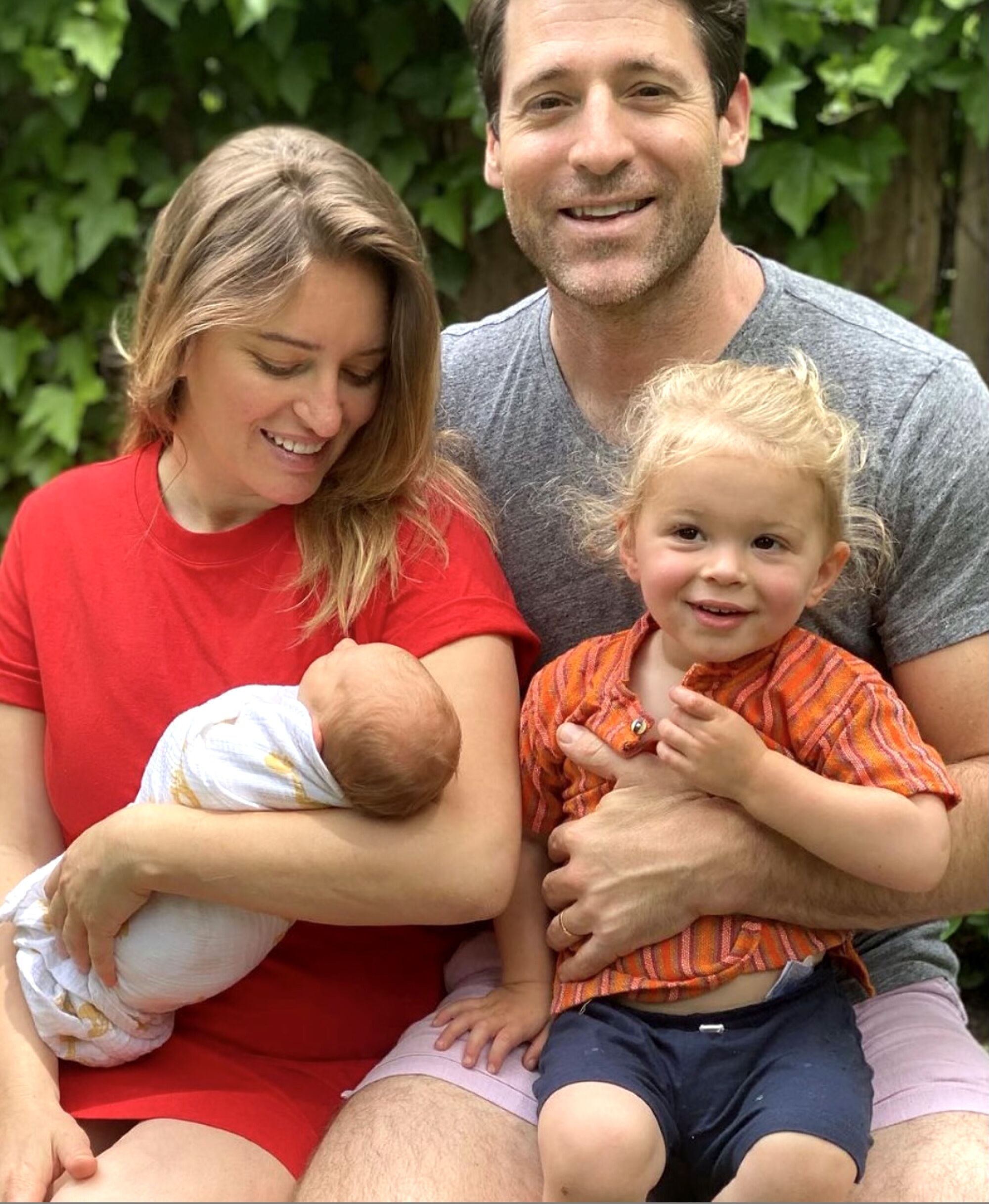 Katy Tur, left, with her husband, Tony Dokoupil, and their two children.