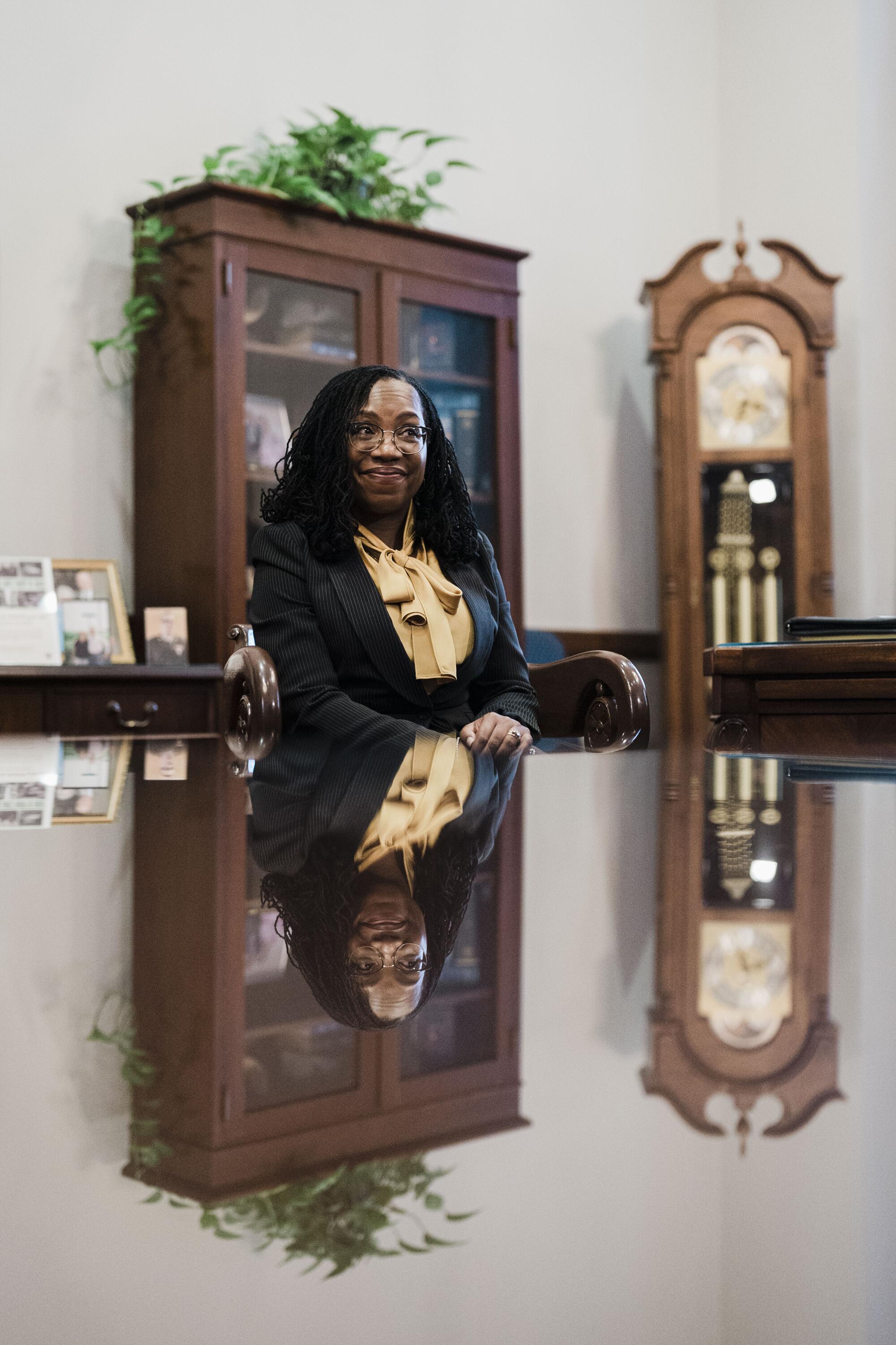 Judge Ketanji Brown Jackson sits at a table.