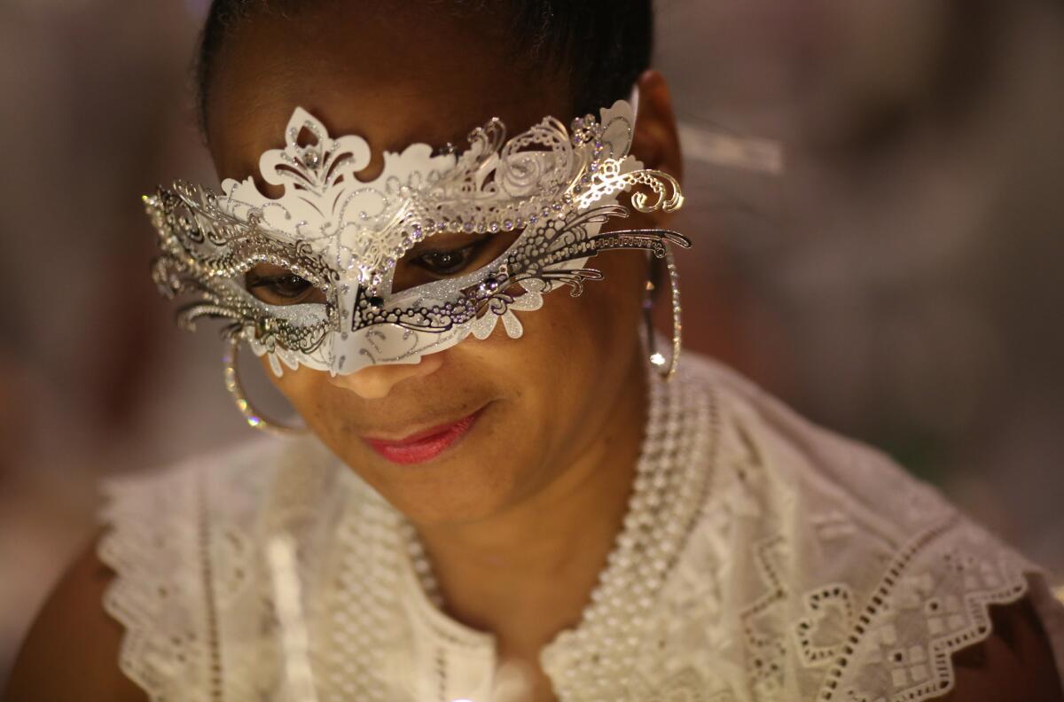 Arlene Sangster wears a mask at Diner en Blanc.