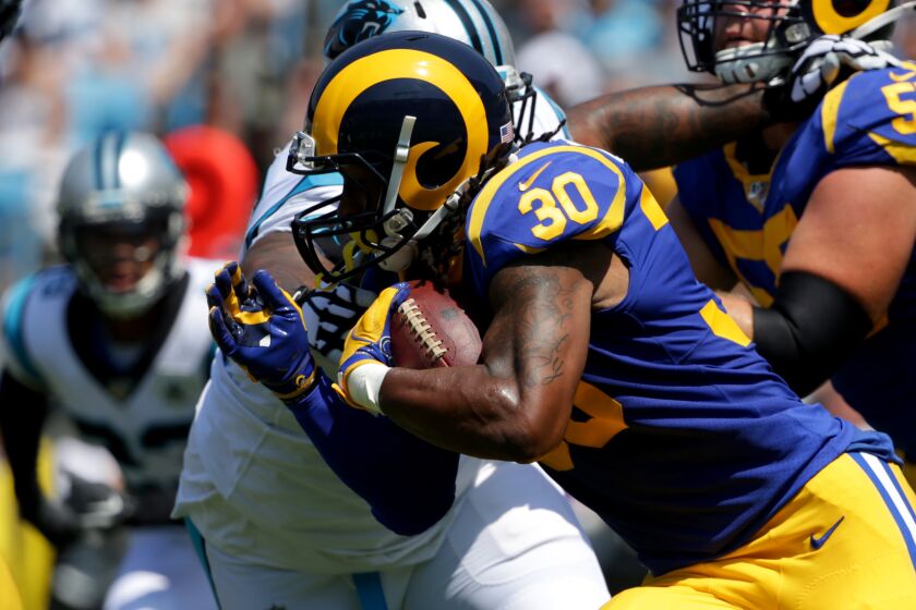 CHARLOTTE, NORTH CAROLINA - SEPTEMBER 08: Running back Todd Gurley #30 of the Los Angeles Rams runs the ball against the Carolina Panthers in the game at Bank of America Stadium on September 08, 2019 in Charlotte, North Carolina. (Photo by Streeter Lecka/Getty Images)