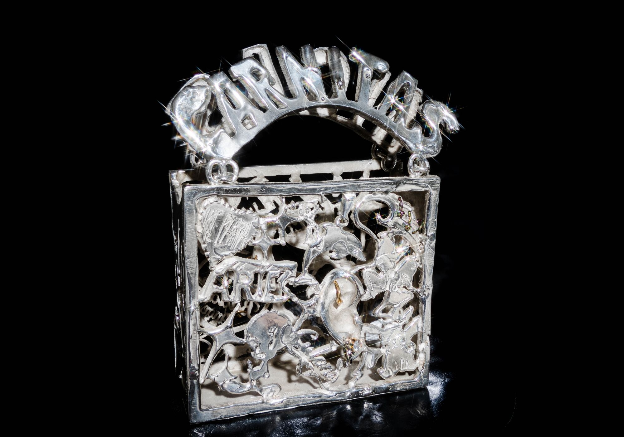 Photo of “KEPERRA” — a sterling silver casted purse made by Georgina Treviño for Image magazine.