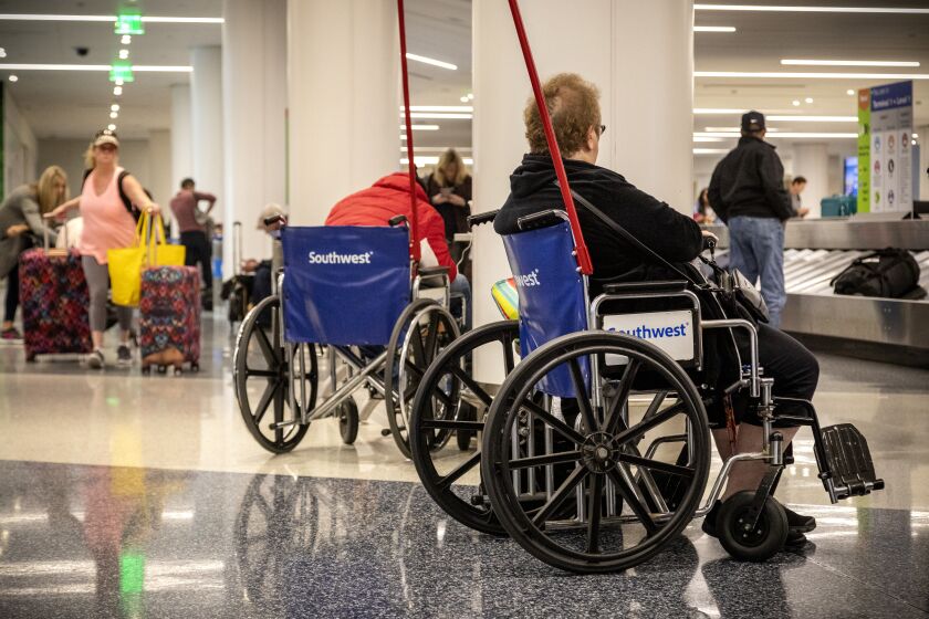 LOS ANGELES, CA, NOVEMBER 07 2019 - Travelers using the S.A.S. wheelchair service at Southwest Airlines’ terminal 1 at LAX on November 07, 2019. (Photo By Ricardo DeAratanha / Los Angeles Times)