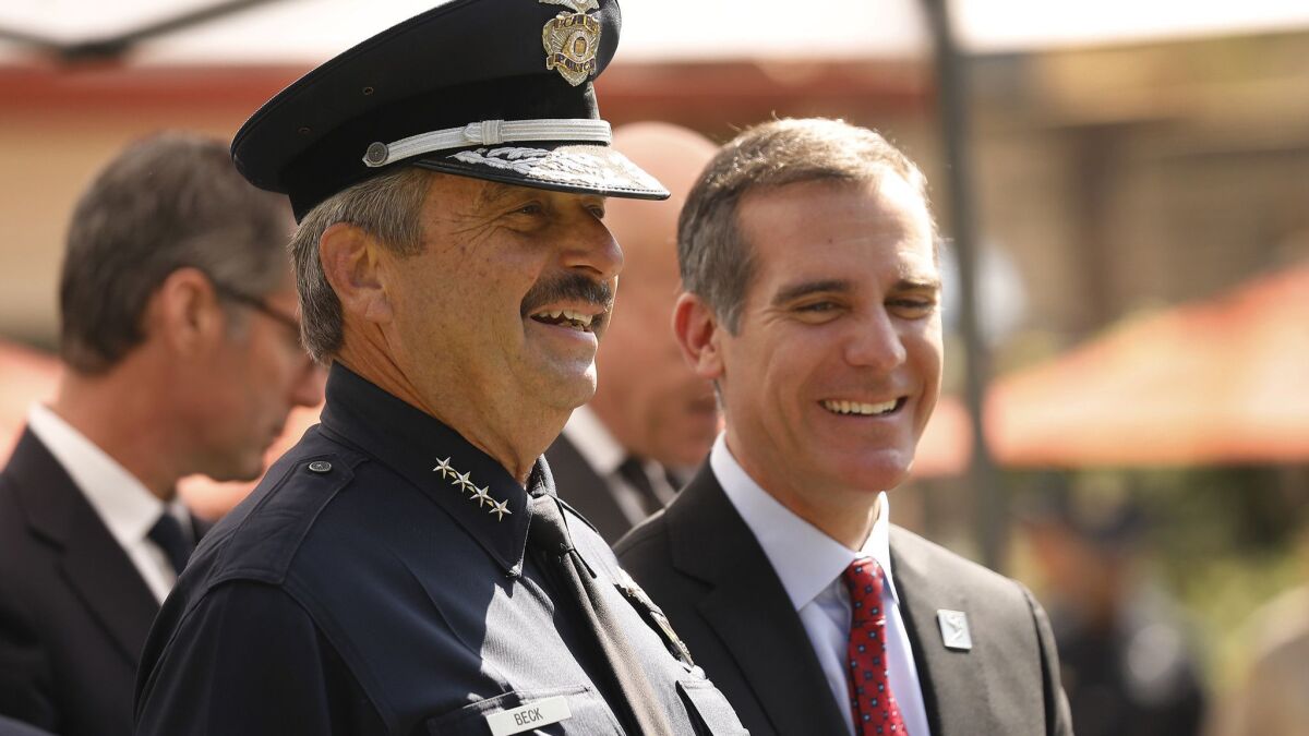 LAPD Chief Charlie Beck, left, and L.A. Mayor Eric Garcetti are shown on May 3.