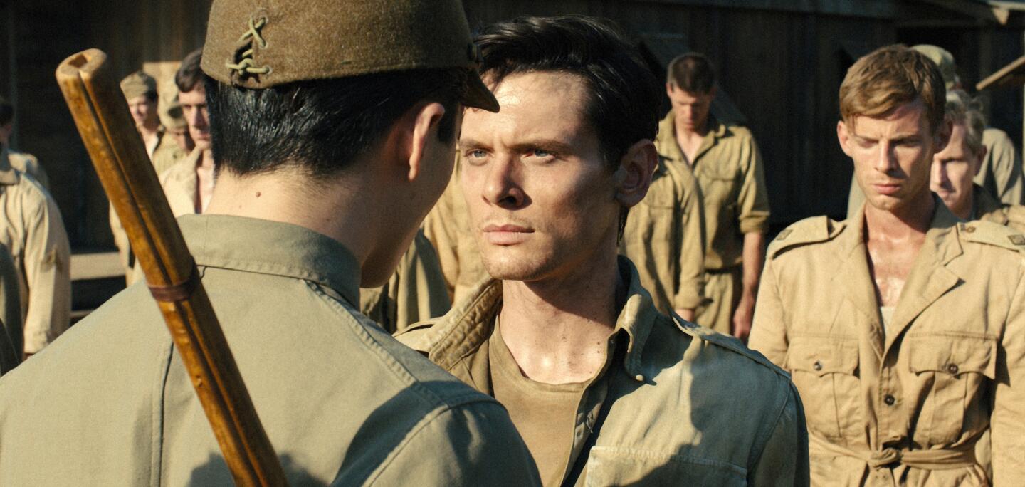 Jack O'Connell plays Louis Zamperini in "Unbroken," adapted from the biography by Lauren Hillenbrand.