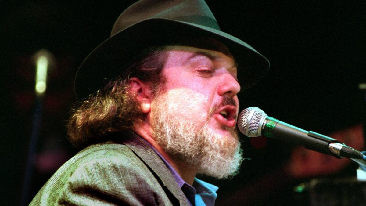 Dr. John, shown performing in Santa Ana in 1995, carried on the tradition of New Orleans piano practice of predecessors such as Professair Longhair, James Booker and Allen Toussaint.