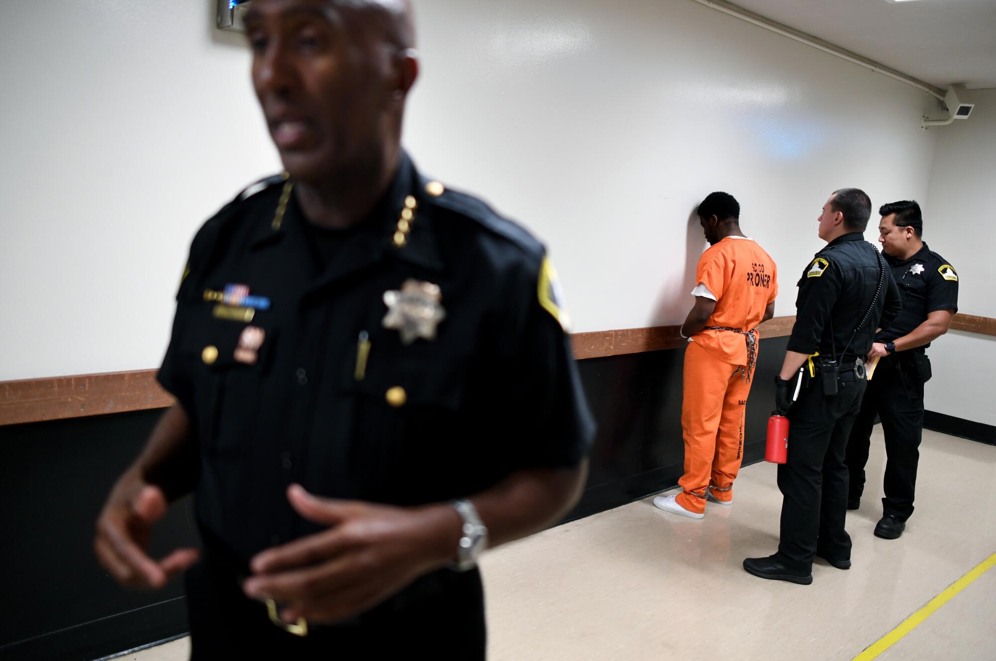 Sacramento County Sheriff Jim Cooper speaks inside the city's main jail.