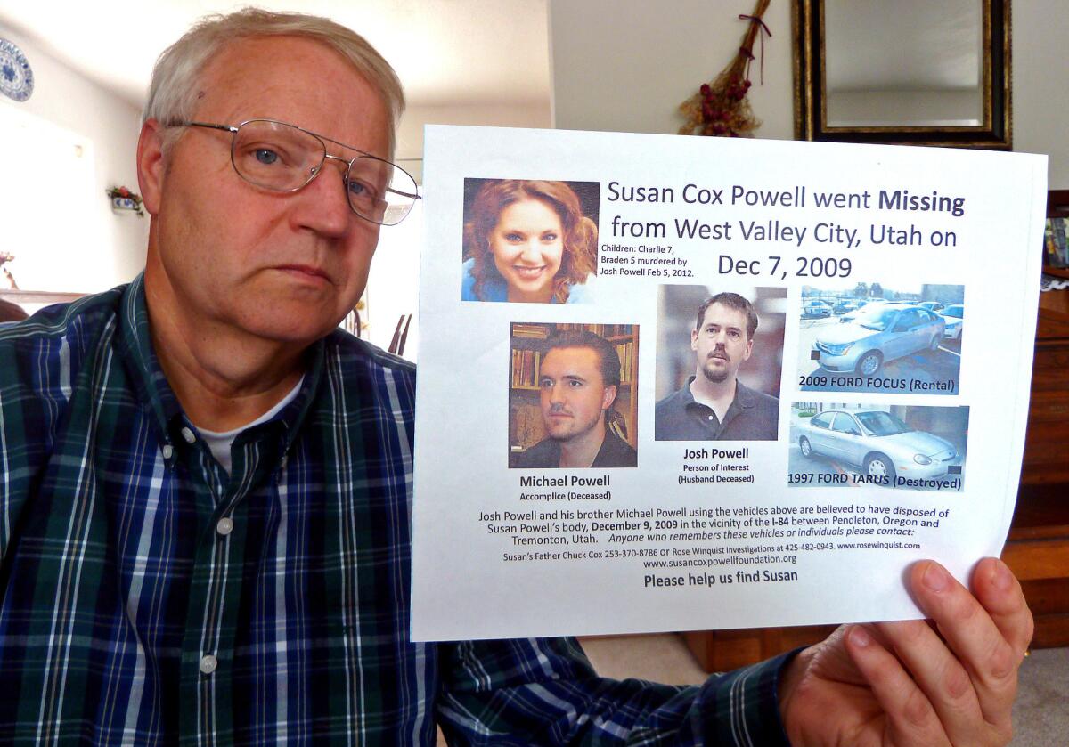 Chuck Cox at home in Puyallup. He holds a flier asking for help in his daughter's disappearance.