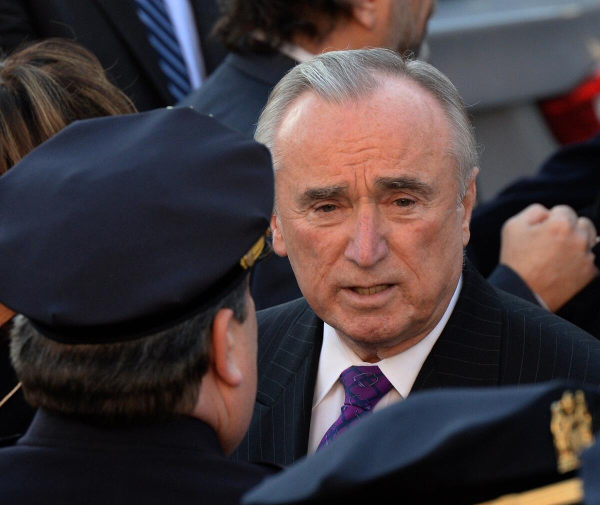 New York Police Commissioner William Bratton arrives for the funeral of New York police Officer Rafael Ramos Saturday in New York.