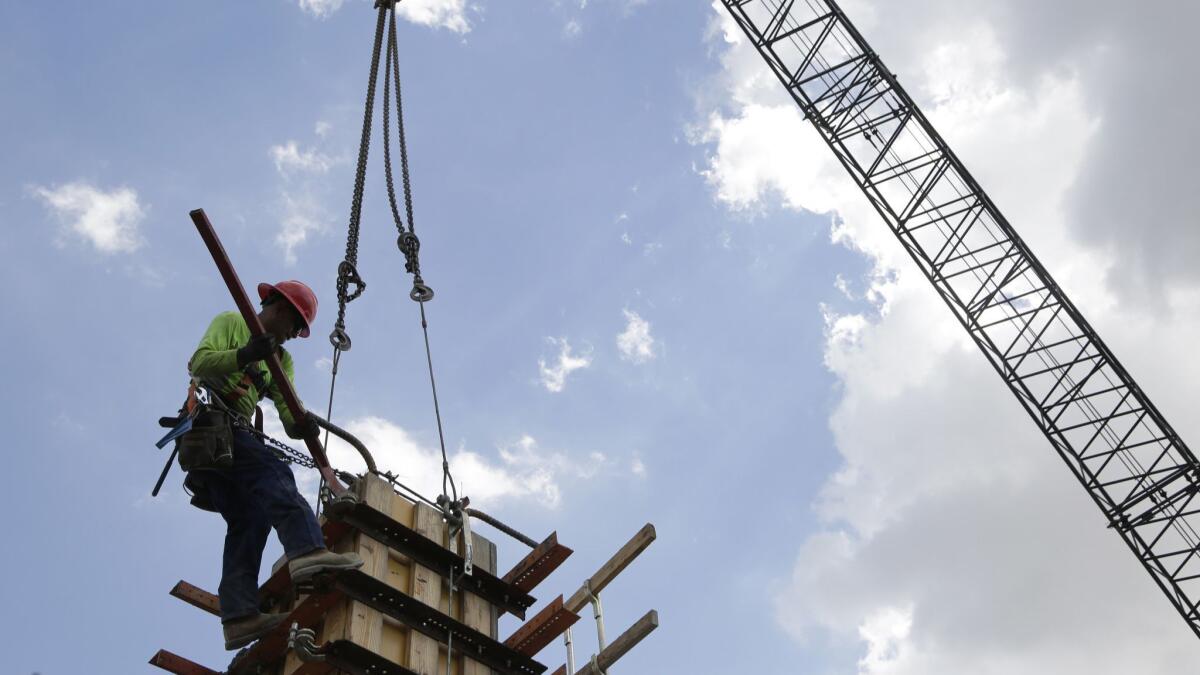 A hard hat works on the foundation of Gables Station, a mixed-use project in Coral Gables, Fla., that kicked off construction last month.