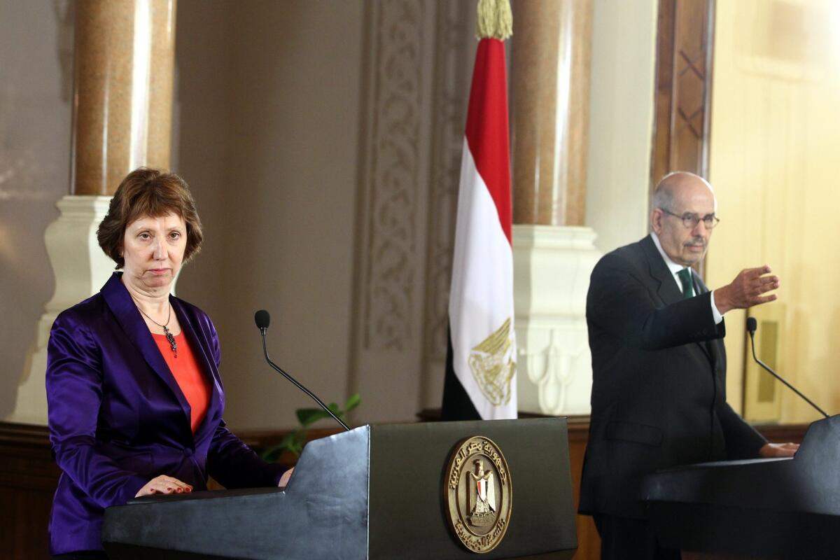 European Union envoy Catherine Ashton and Egyptian interim Vice President Mohamed El-Baradei speak to reporters at a news conference in Cairo on Tuesday.