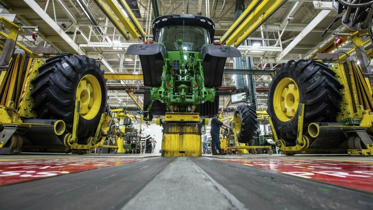 A John Deere tractor being built in Iowa. The most aggressive moves in fully autonomous farm equipment have come from a couple of small start-ups, not industry leaders like Deere.