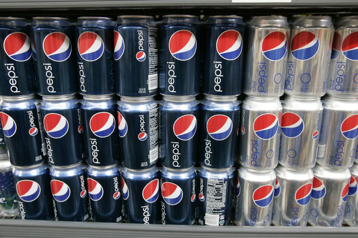 In this Feb. 9, 2009 file photo, Pepsi drinks are on display at JJ&F Market in Palo Alto, Calif.