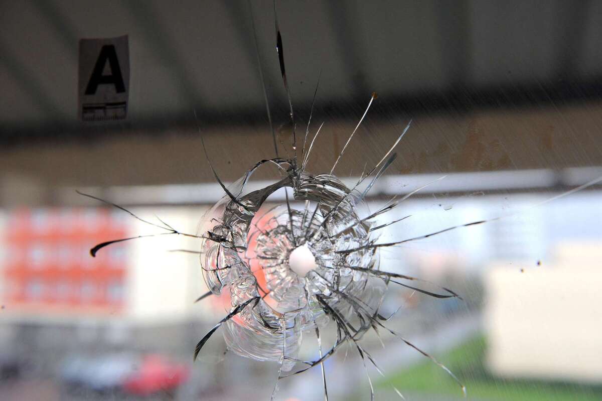 A bullet hole is pictured in the window of a prayer room at a mosque in the Sablons neighborhood of Le Mans, western France, on January 8, 2015, after shots were fired and three blank grenades were thrown at the mosque shortly after midnight, leaving no casualties. Muslims places of worship in two French towns were fired upon overnight, leaving no casualties, prosecutors said on January 8. France is on edge following the deadly assault by heavily armed gunmen on satirical magazine Charlie Hebdo on January 7 that left 12 dead. No link has yet been established between the attacks. AFP PHOTO / JEAN-FRANCOIS MONIER JEAN-FRANCOIS MONIER/AFP/Getty Images ** OUTS - ELSENT, FPG - OUTS * NM, PH, VA if sourced by CT, LA or MoD **