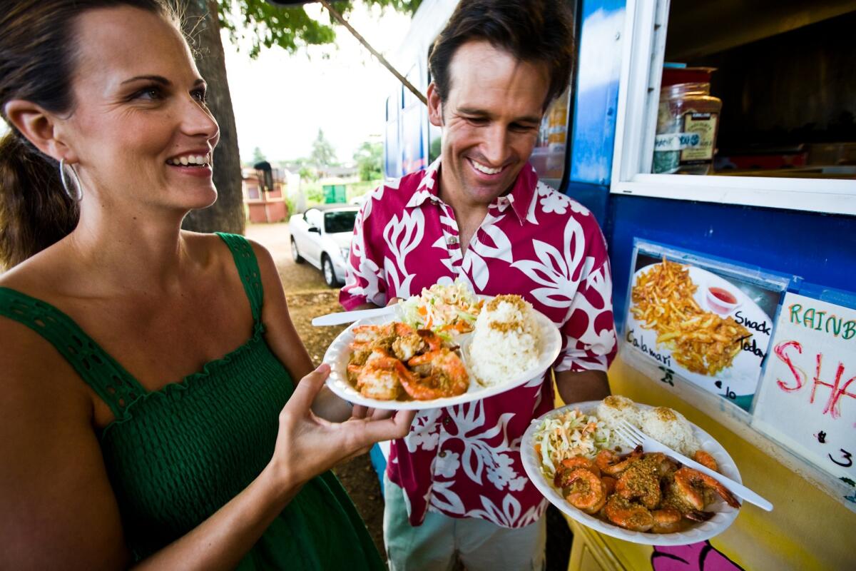 Thousands of Hawaii food establishments, including this shrimp truck on Oahu, must now post color-coded placards to indicate how well they have fared with state health inspectors.