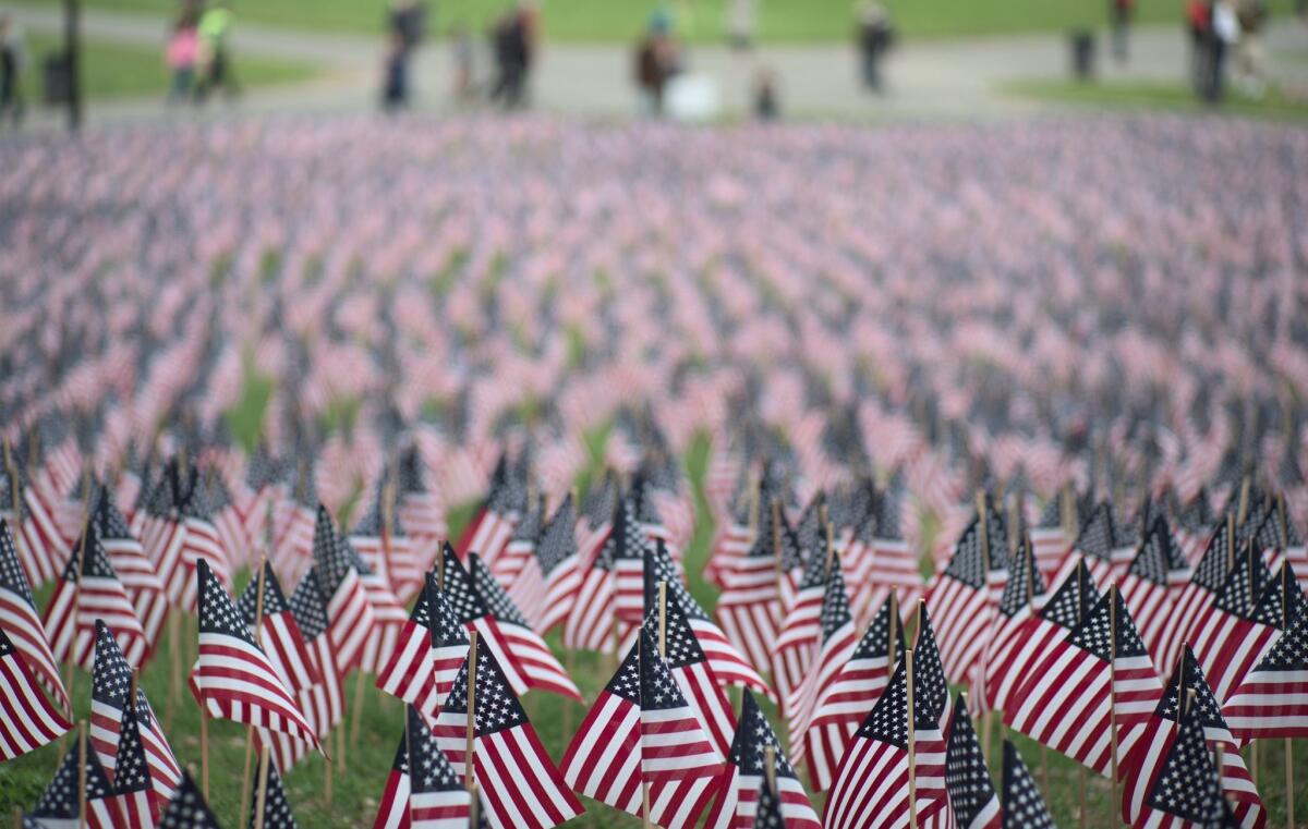 A garden of 37,000 flags representing each Massachusetts soldier lost since the Revolutionary War was displayed on the Boston Common earlier this year.
