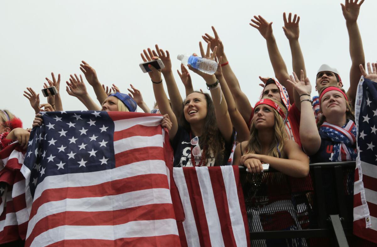 Fans in Chicago watch on a big screen Thursday as the United States played Germany at the 2014 World Cup in Brazil .
