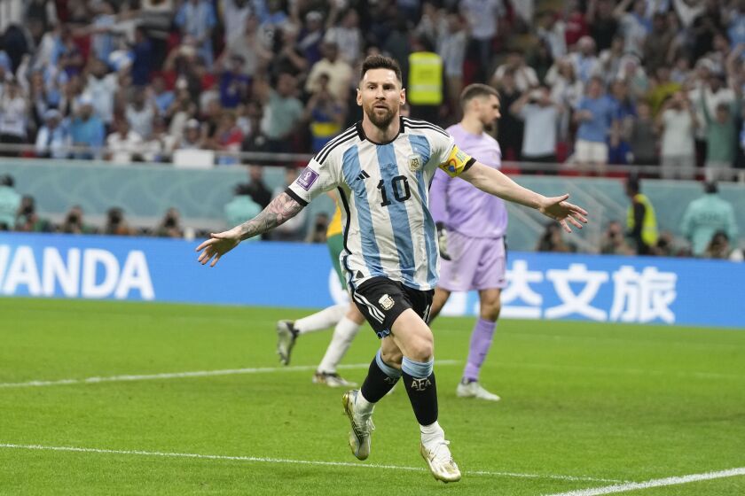 Argentina's Lionel Messi celebrates scoring the opening goal during the World Cup round of 16 soccer match between Argentina and Australia at the Ahmad Bin Ali Stadium in Doha, Qatar, Saturday, Dec. 3, 2022. (AP Photo/Thanassis Stavrakis)