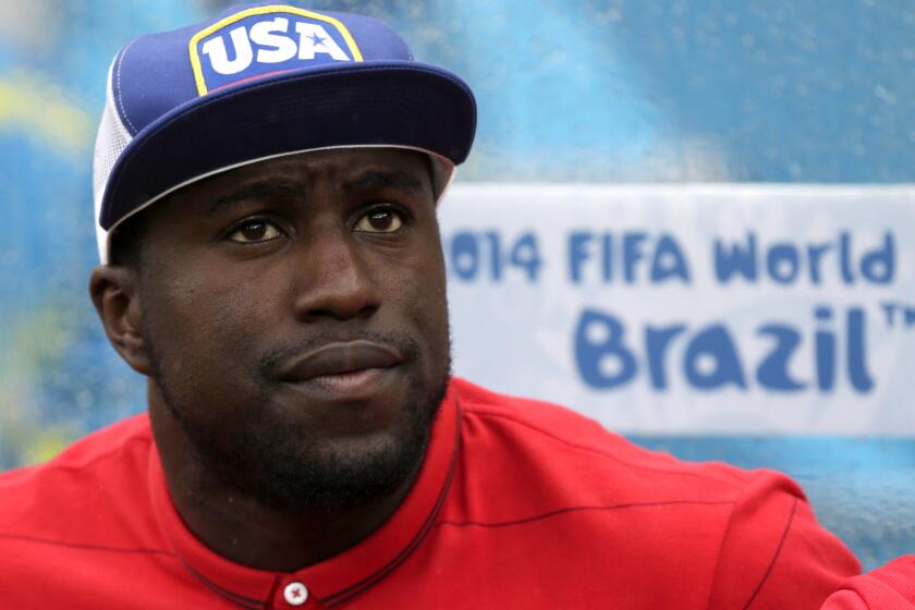 Jozy Altidore watches from the bench as the U.S. and German World Cup teams play in Recife, Brazil, on June 26.