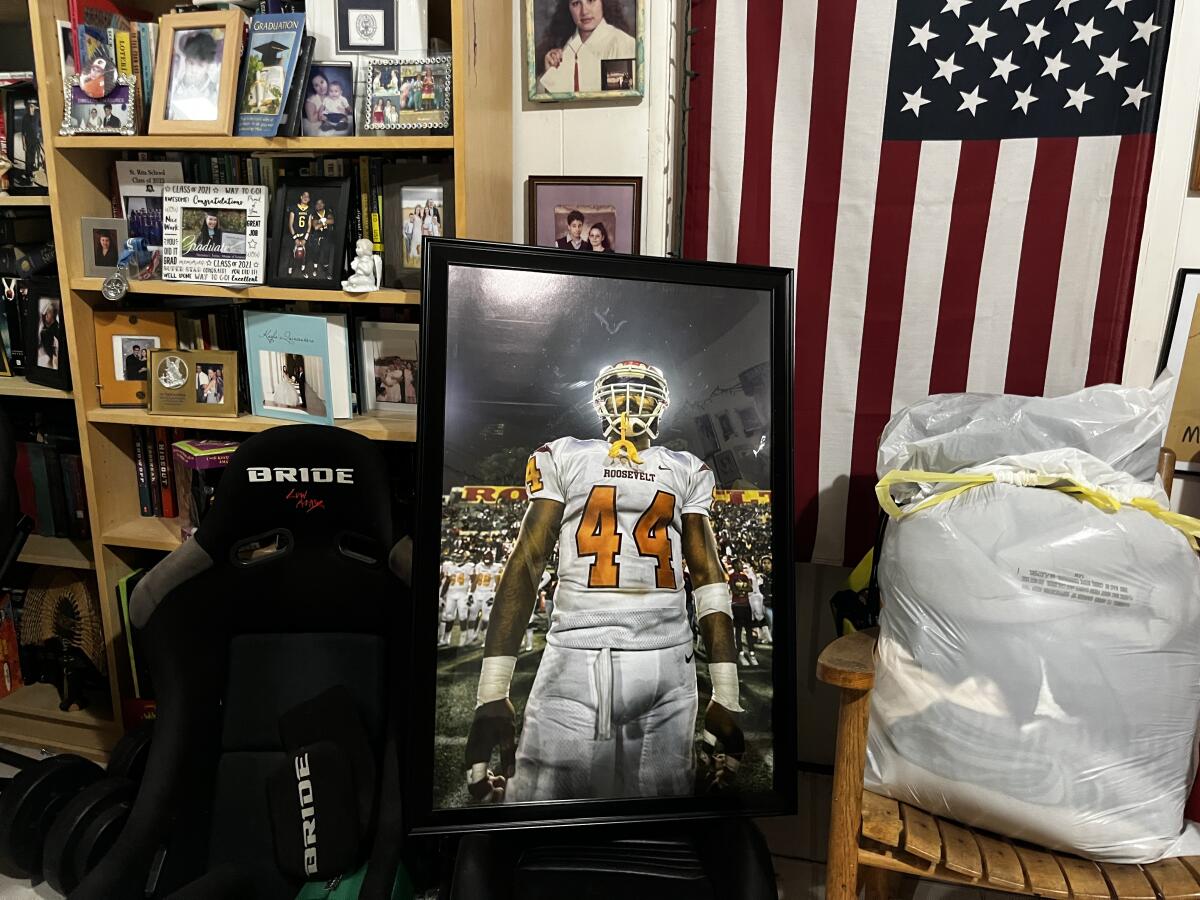 A framed photo of late Roosevelt running back Santos Rivera, who died tragically in early June, in aunt Andrea Rivera's home.