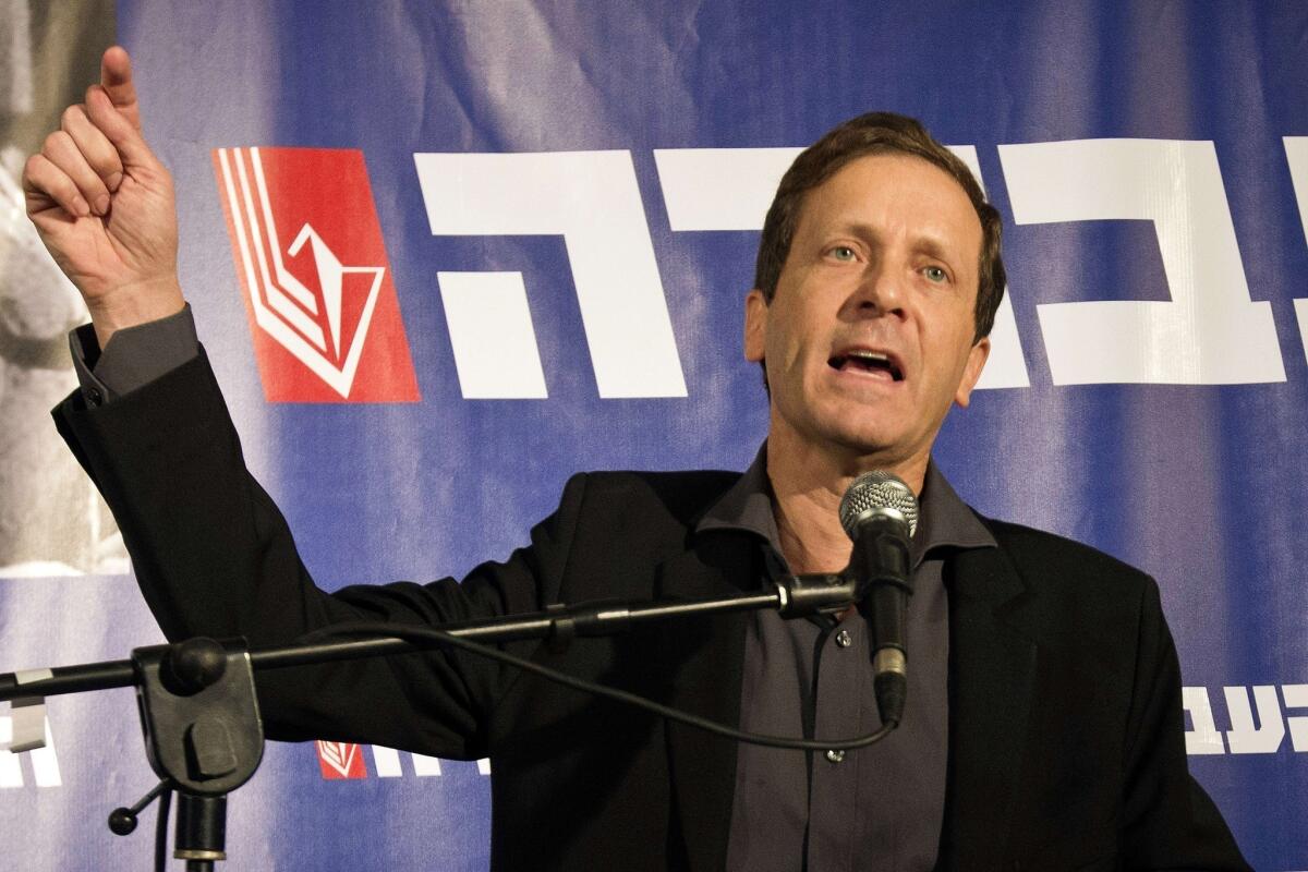 Isaac Herzog, newly elected chairman of Israel's Labor Party, gives a speech following the announcement of his victory in Tel Aviv.