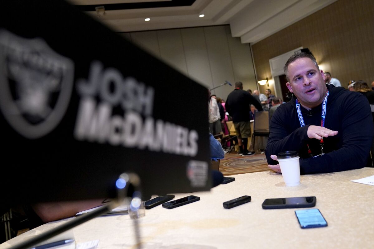 Las Vegas Raiders head coach Josh McDaniels speaks during the AFC head coaches availability at the NFL meetings, Monday, March 27, 2023, in Phoenix. (AP Photo/Matt York)