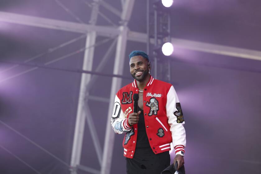 Jason Derulo performing at the SB Tailgate during the NFL Super Bowl 57 football game, Sunday, Feb. 12, 2023, in Glendale, Ariz. (AP Photo/Tyler Kaufman)
