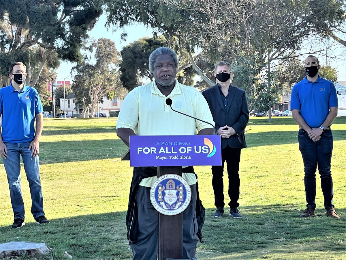 Formerly homeless man Mickey Major speaks during a press conference at North Park Community Park.