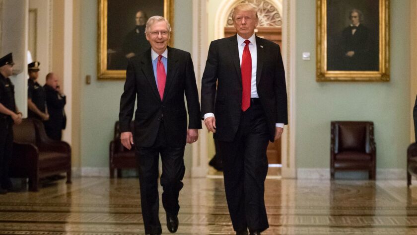 President Trump and Senate Majority Leader Mitch McConnell walk together