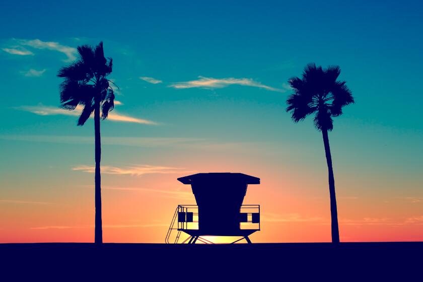 Vintage Lifeguard Tower on Beach at sunset in San Diego, California