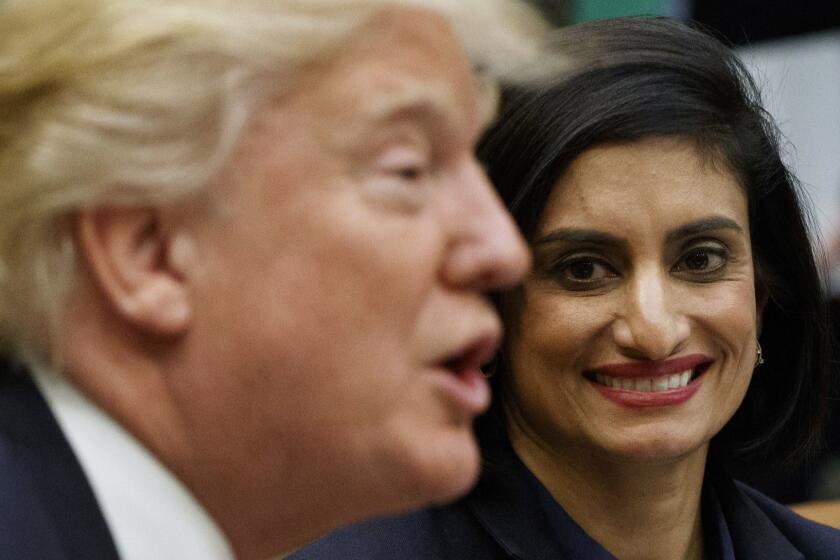 FILE - In this March 22, 2017 file photo, Administrator of the Centers for Medicare and Medicaid Services Seema Verma listen at right as President Donald Trump speaks during a meeting in the Roosevelt Room of the White House in Washington. Work requirements for Medicaid could lead to major changes in the social safety net under President Donald Trump. The question: Should adults who are able to work be required to do so to get taxpayer provided health insurance? (AP Photo/Evan Vucci, File)