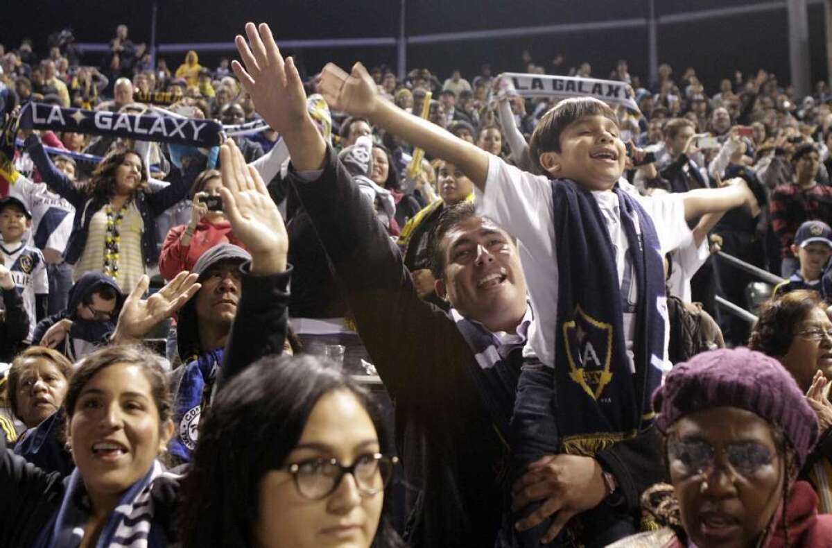 Galaxy fans celebrate the team's second consecutive MLS Championship on Dec. 3, 2012.