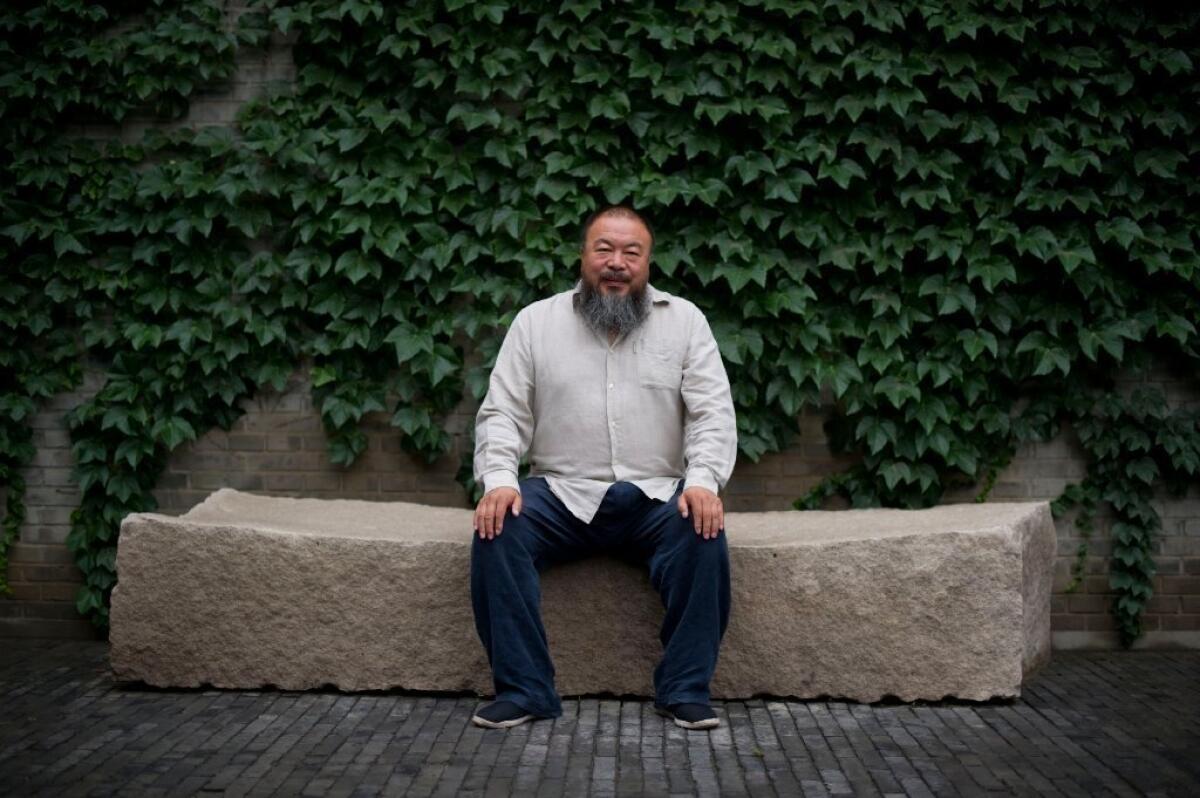 Ai Weiwei outside his Beijing studio in 2012.