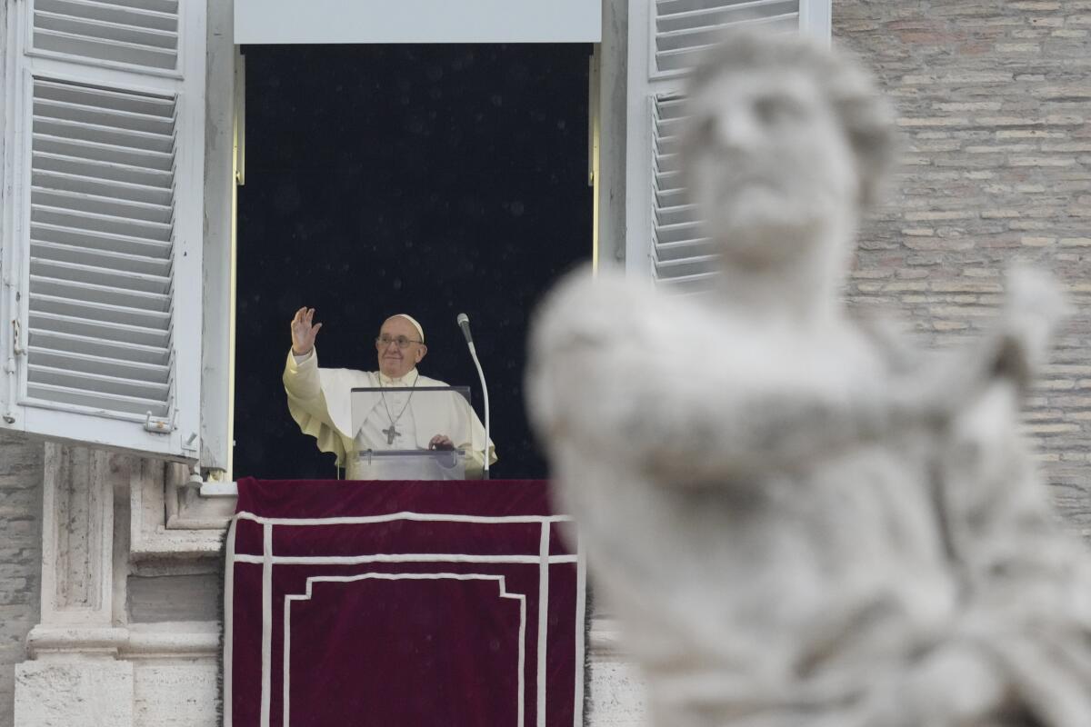 Pope Francis at a window overlooking St. Peter's Square
