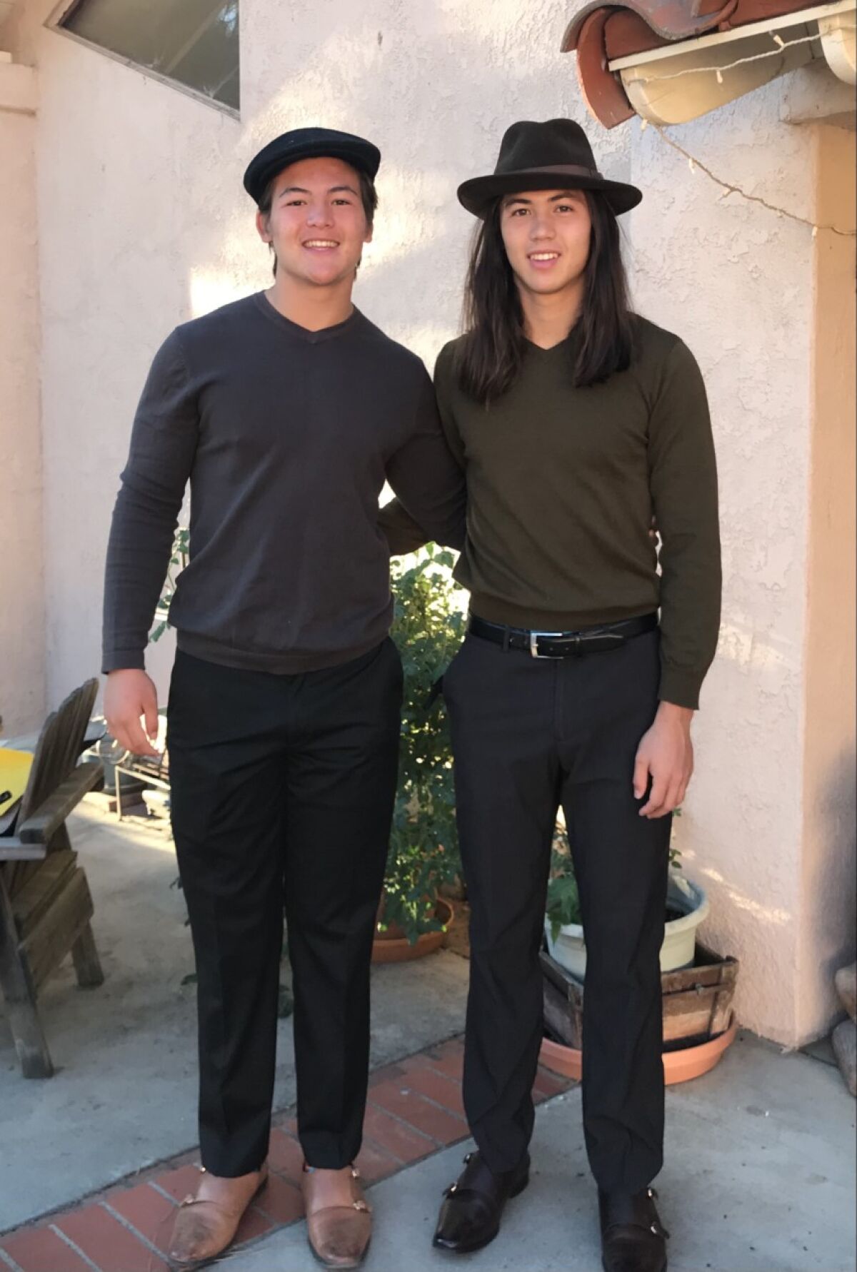 Freshman quarterback Bear Bachmeier (left) and junior receiver Tiger Bachmeier of Murrieta Valley pose for a photo.