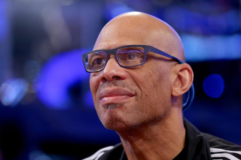 Kareem Abdul-Jabbar attends the Shooting Stars competition during the 2014 NBA All-Star weekend in February.