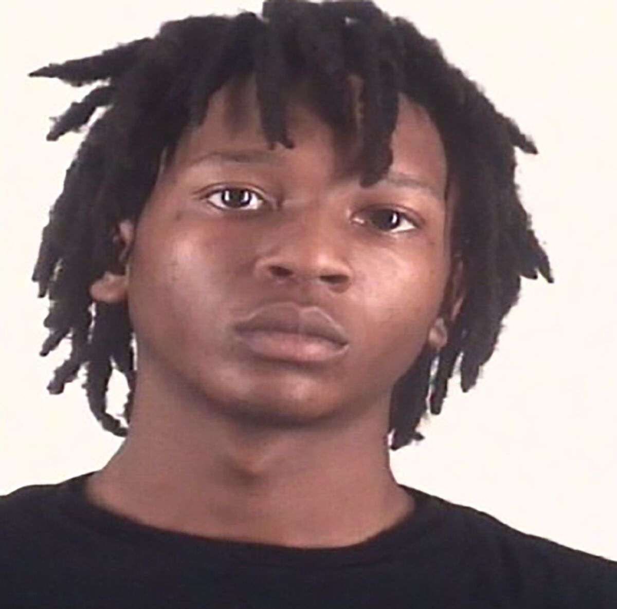 This image provided by the Tarrant County, Texas, Sheriff’s Office, shows Timothy George Simpkins. The 18-year-old student was indicted on Friday, Feb. 11, 2022, on attempted murder and aggravated assault charges for an Oct. 6 shooting at a Dallas-area high school that wounded two students and a teacher. (Tarrant County Sheriff’s Office via AP)