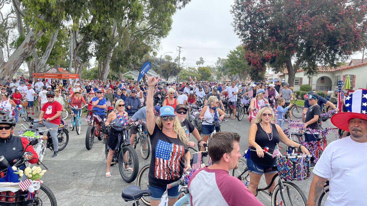 Riders enjoy the bicycle cruise in Huntington Beach in 2021.